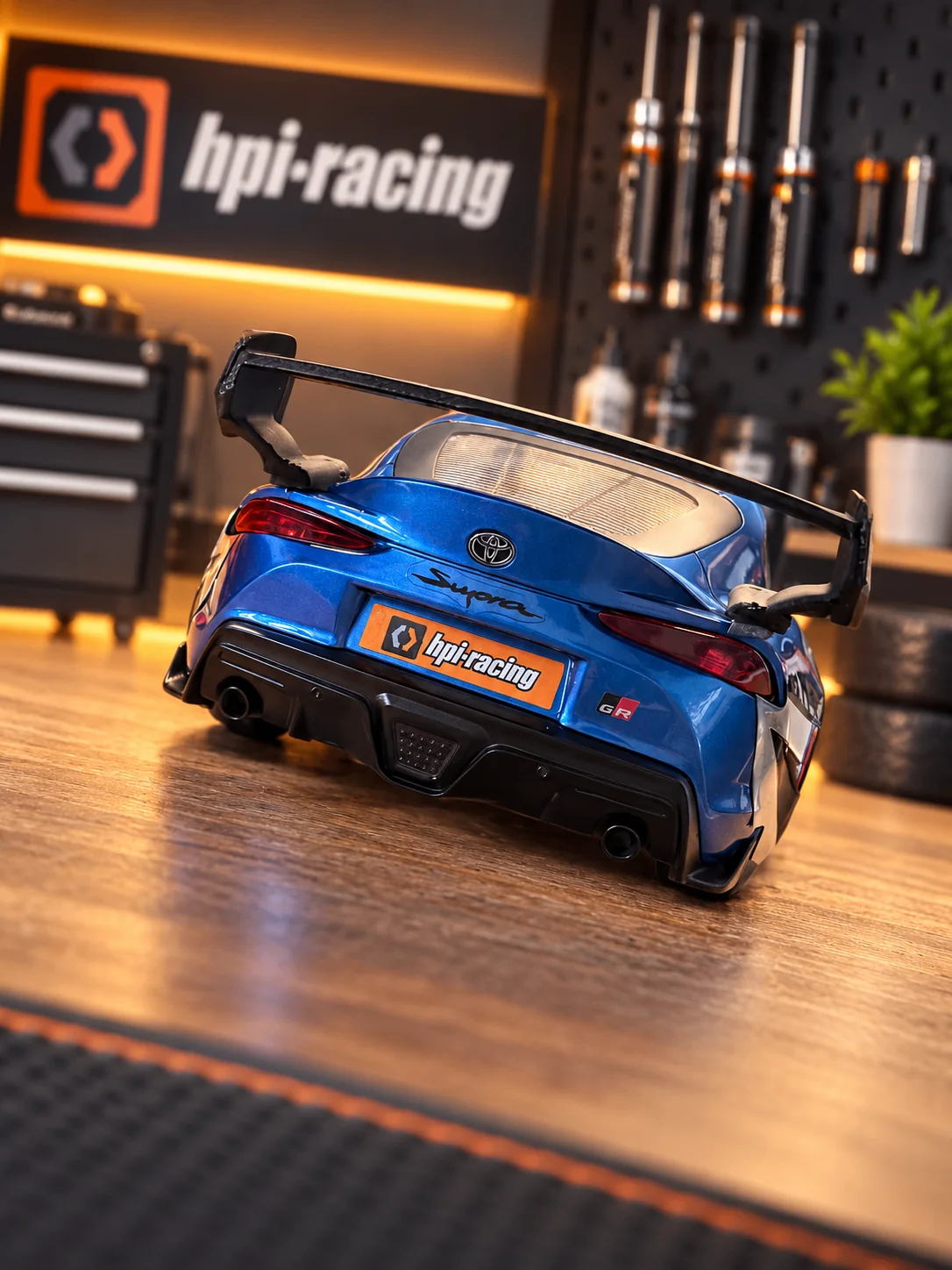 Rear view of the blue HPI Stage-D24 Toyota GR Supra