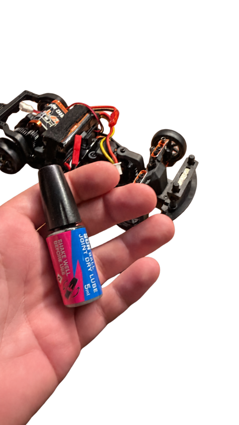 Dry lubricant for the front suspension