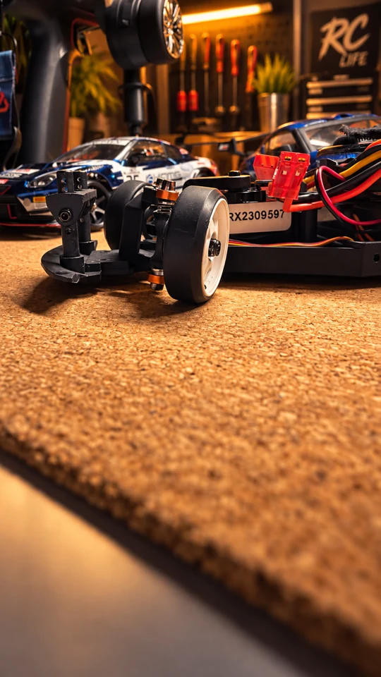 Angled view of the HPI front wheel and suspension