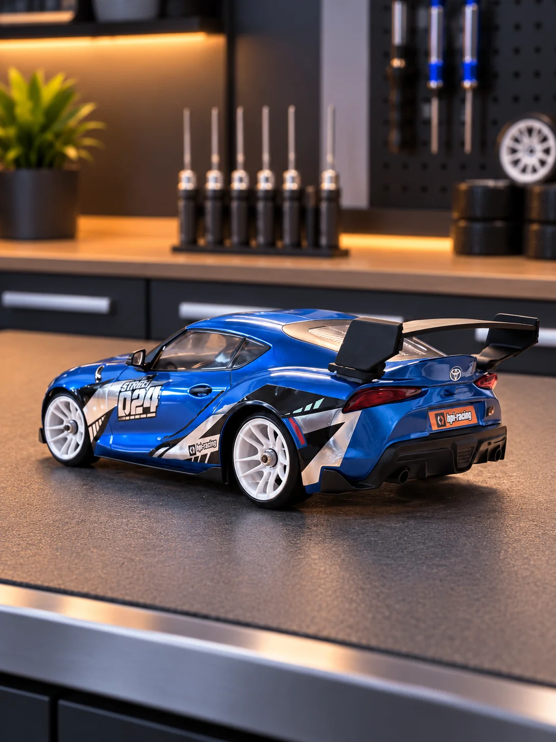 Blue HPI Stage-D24 Toyota GR Supra from the rear quarter